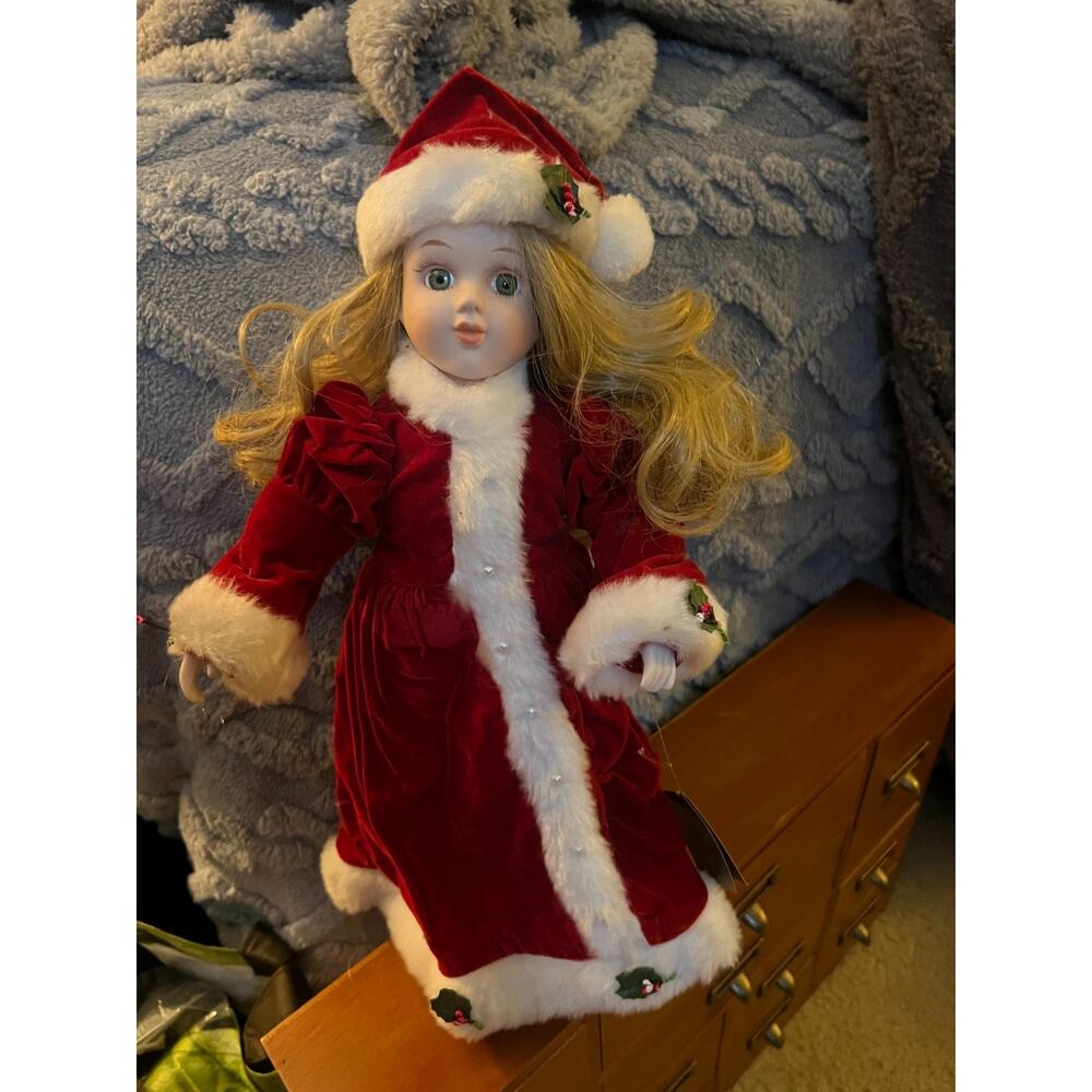 Vintage porcelain doll Christmas themed from the 90's